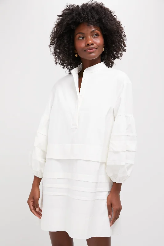 Mini dresses with asymmetric hems for a fashion - forward look White Chelsea Dress