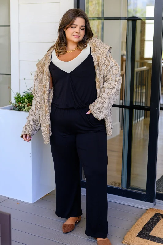 Women jumpsuits with a criss - cross back for a flirty and eye - catching detail Completely Justified Jumpsuit in Black Women jumpsuits with a criss - cross back for a flirty and eye - catching detail Completely Justified Jumpsuit in Black