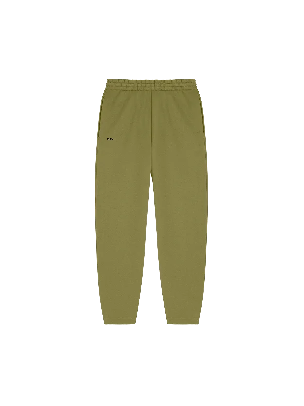 Women's Ankle - Length Sweatpants in Olive Green with Reflective Stripes for Nighttime Runs Womens DNA Barrel-Leg Track Pants—highland green Women's Ankle - Length Sweatpants in Olive Green with Reflective Stripes for Nighttime Runs Womens DNA Barrel-Leg Track Pants—highland green
