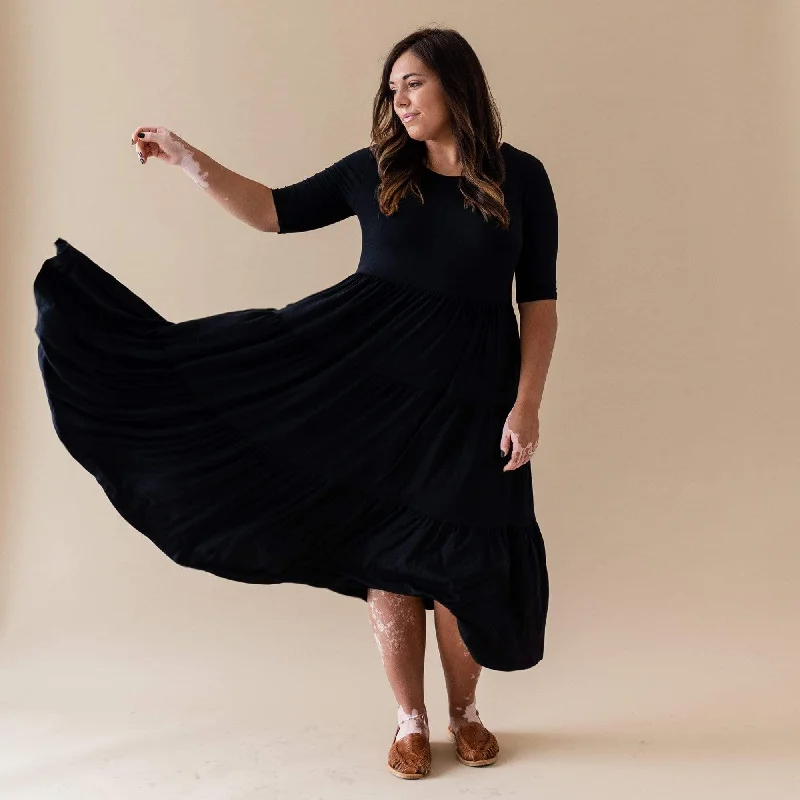 Women jumpsuits with a button - down front for a versatile and casual style Women’s Tiered Dress in Midnight Women jumpsuits with a button - down front for a versatile and casual style Women’s Tiered Dress in Midnight