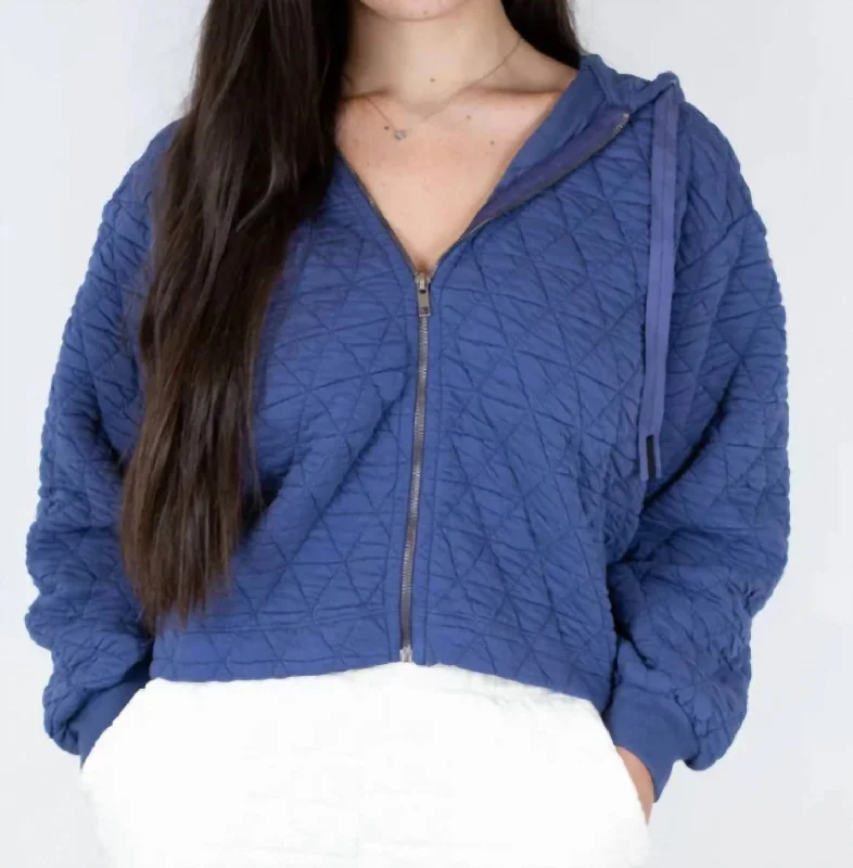 Washed - Out Denim Top for a Vintage Aesthetic Quilted Knit Zip-Up Jacket In Denim