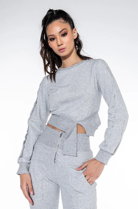 Women's long - sleeve cropped sweatshirt with ribbed cuffs for a snug fit COME CLOSER CUT OUT DETAIL SWEATSHIRT HEATHER GREY Women's long - sleeve cropped sweatshirt with ribbed cuffs for a snug fit COME CLOSER CUT OUT DETAIL SWEATSHIRT HEATHER GREY