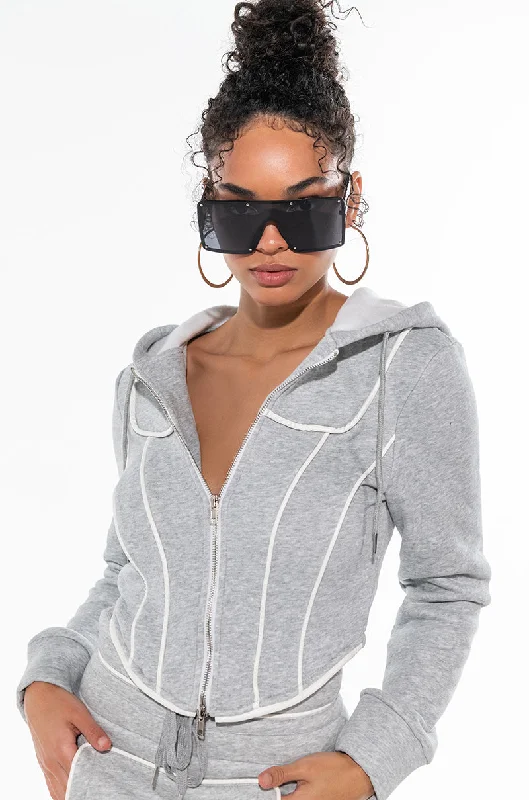 Women's hoodie with a kangaroo pocket and a pom - pom drawstring for added charm THE BABE CASUAL CORSETTED SWEATSHIRT Women's hoodie with a kangaroo pocket and a pom - pom drawstring for added charm THE BABE CASUAL CORSETTED SWEATSHIRT