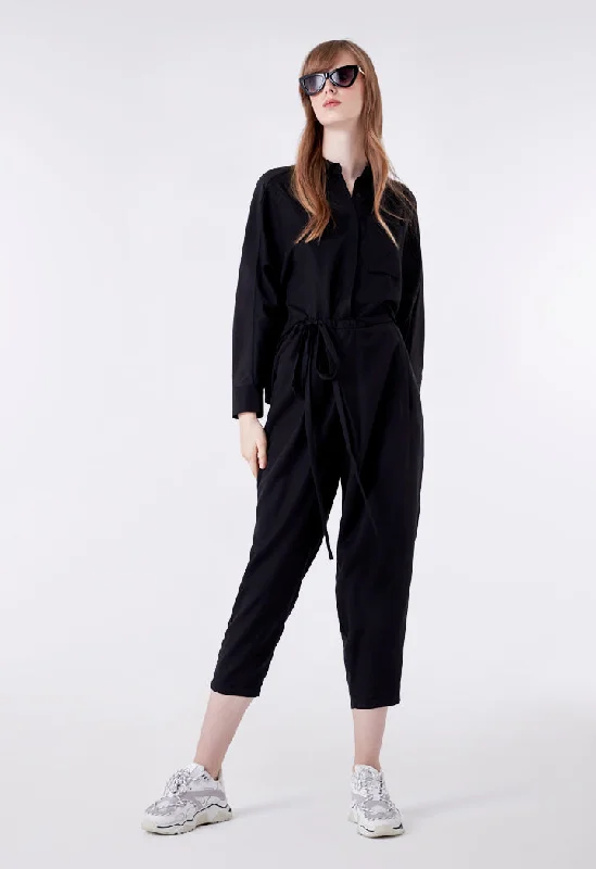 Women jumpsuits with a button - down front for a versatile and casual style Black Tie Front Overlap Jumpsuit