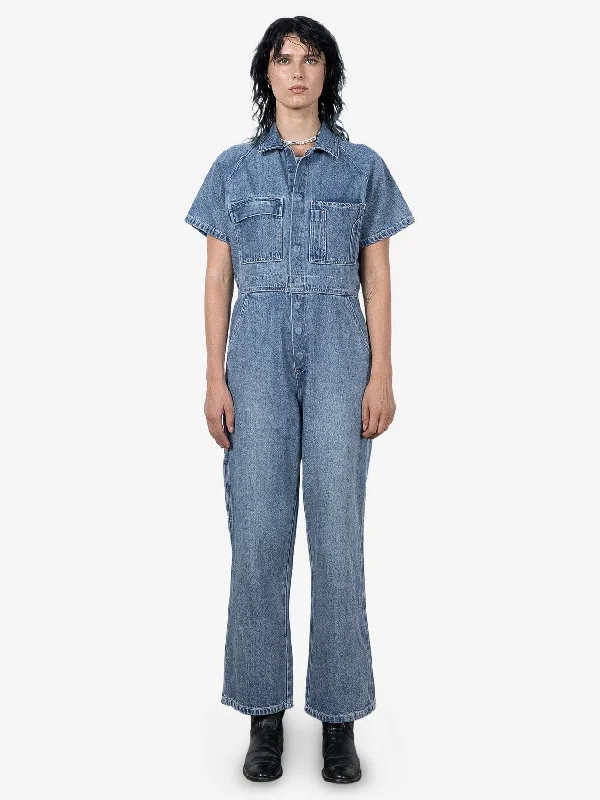 Women jumpsuits with high - low hems for a modern and fashion - forward style HYC Utility Coverall - Weathered Blue Women jumpsuits with high - low hems for a modern and fashion - forward style HYC Utility Coverall - Weathered Blue