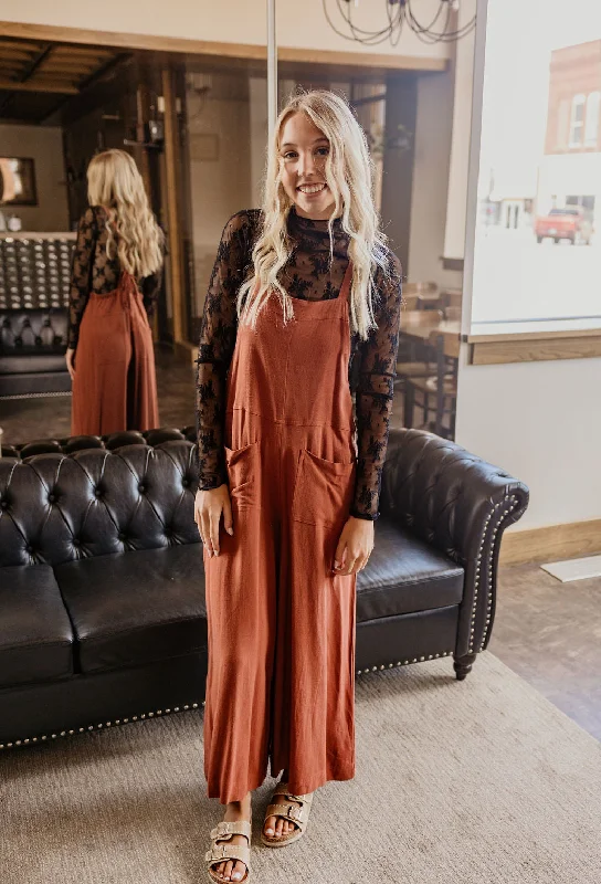 Women jumpsuits with wide - leg pants for a trendy and comfortable fit JANELLE JUMPSUIT 2 COLOR OPTIONS BY IVY & CO Women jumpsuits with wide - leg pants for a trendy and comfortable fit JANELLE JUMPSUIT 2 COLOR OPTIONS BY IVY & CO