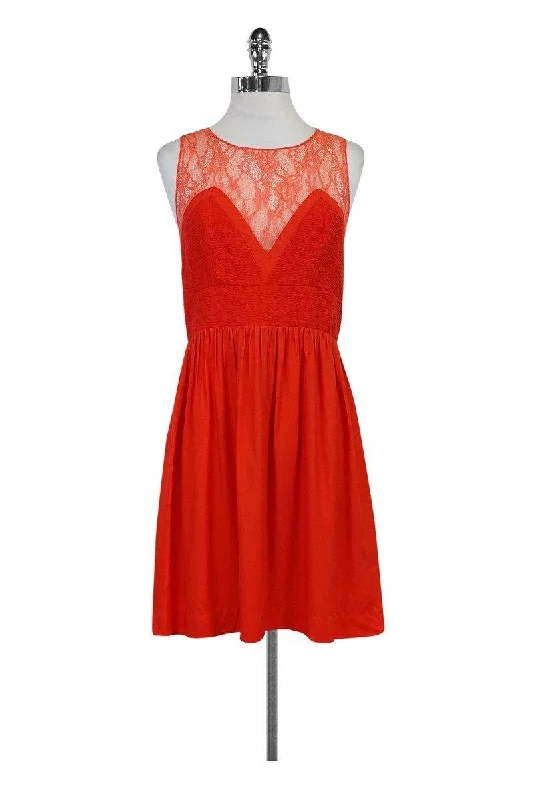 Ruffled Women Dress with Multiple Layers for a Playful and Girly Style Ruffled Women Dress with Multiple Layers for a Playful and Girly Style Sandro - Orange Lace Dress Sz M