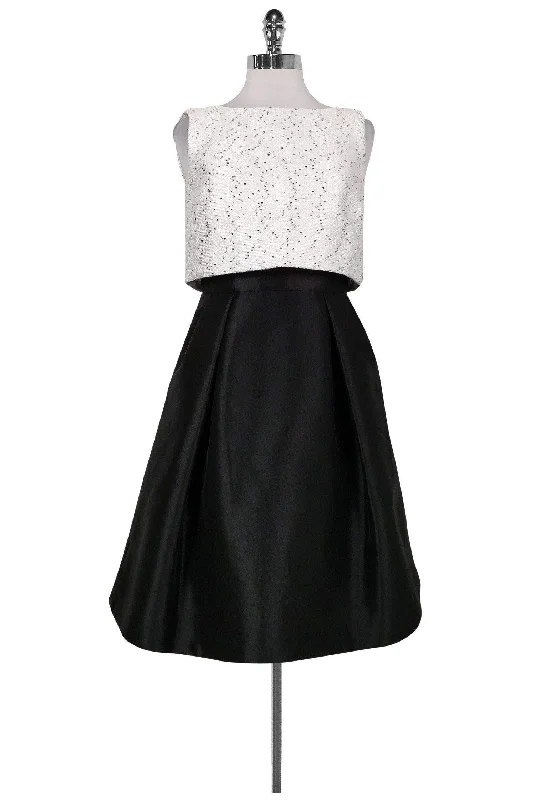 Ruffled Women Dress with Multiple Layers for a Playful and Girly Style Ruffled Women Dress with Multiple Layers for a Playful and Girly Style Theia - White Sequin & Black Flared Dress Sz 4